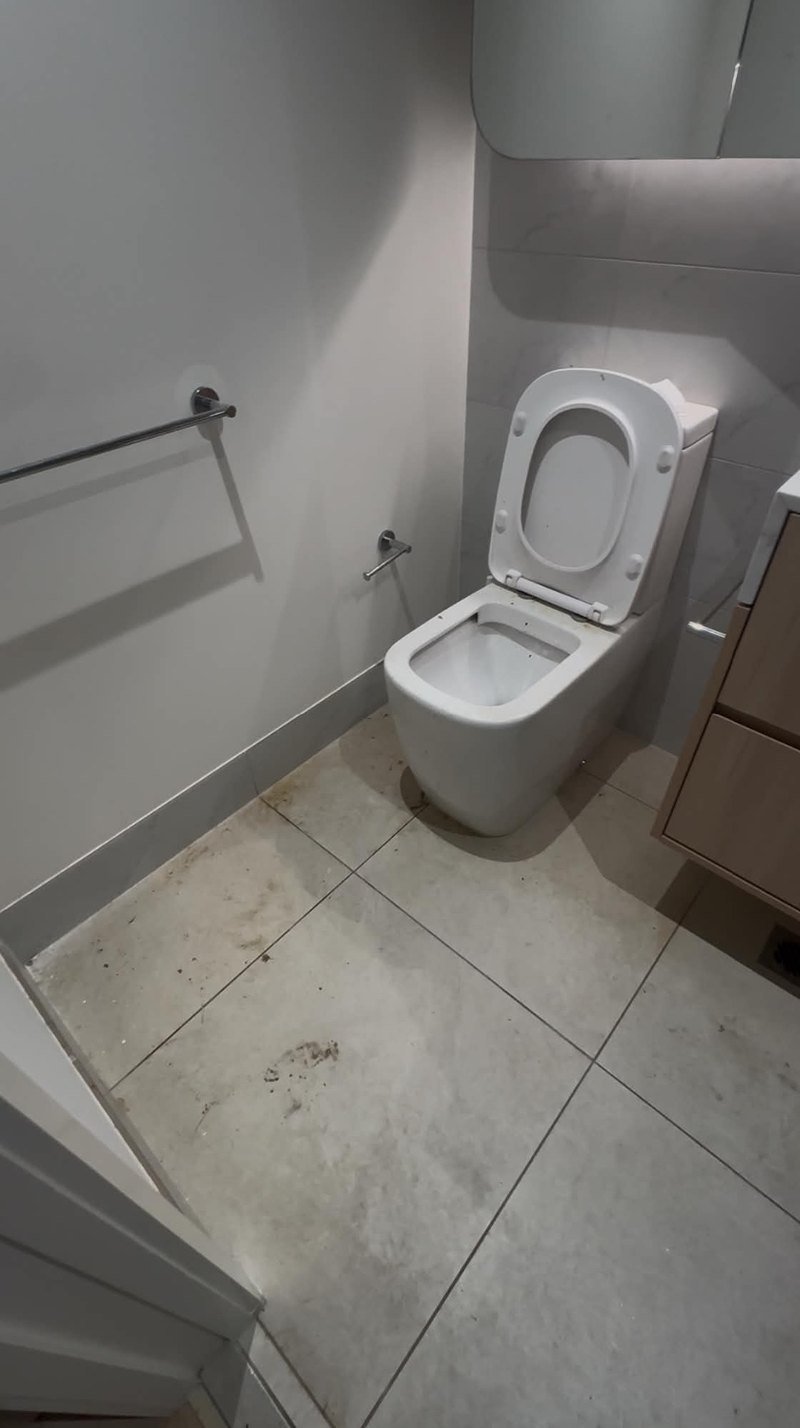Bathroom floor and visible exterior surfaces before cleaning
