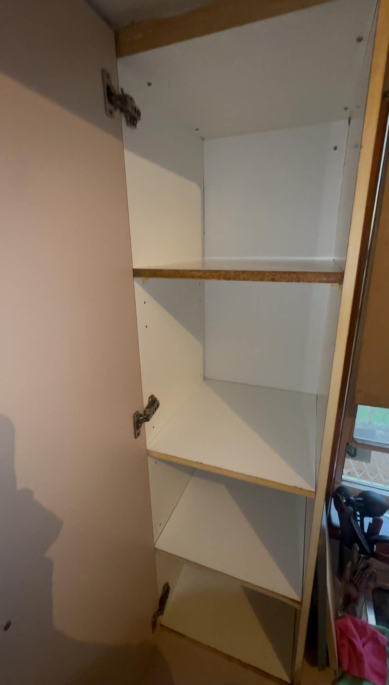 Cupboard interior and shelves after cleaning